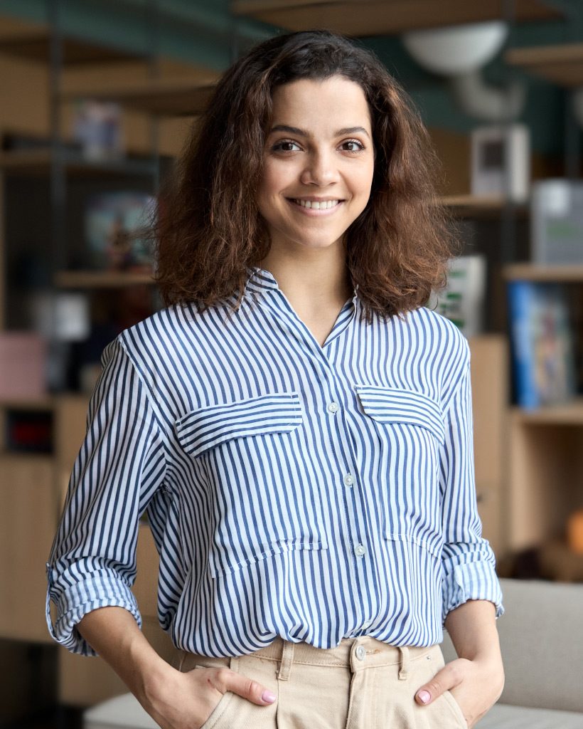 young-latin-girl-student-looking-at-camera-standin-9XHKT7A.jpg